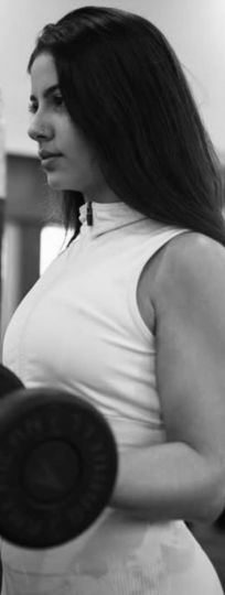 Manu Rios Bootique Fitness Trainer Exercising